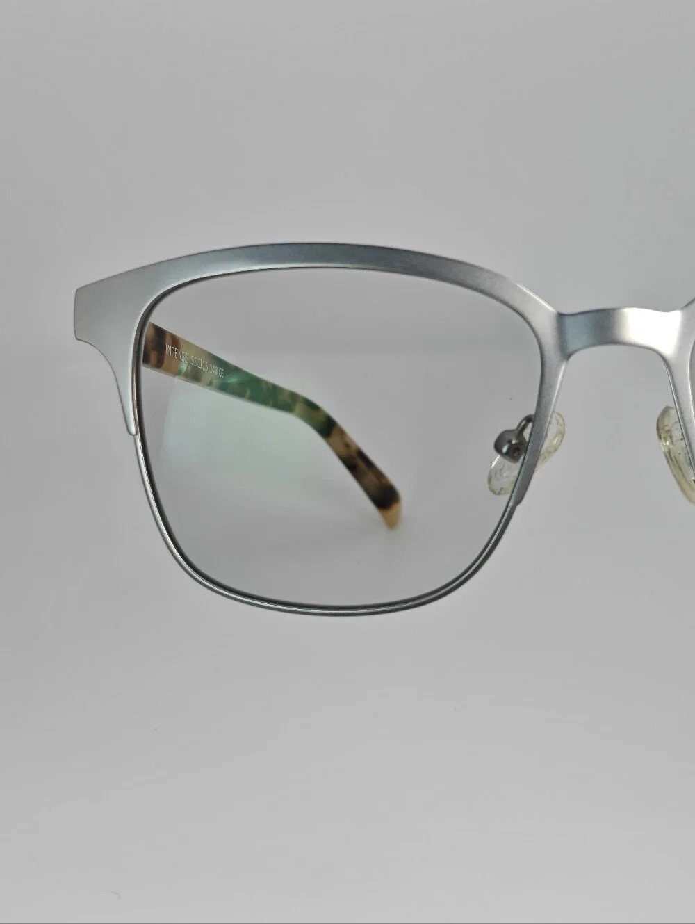 Intense. Brushed Silver Front, Bone Tortoise Temples. Women's.